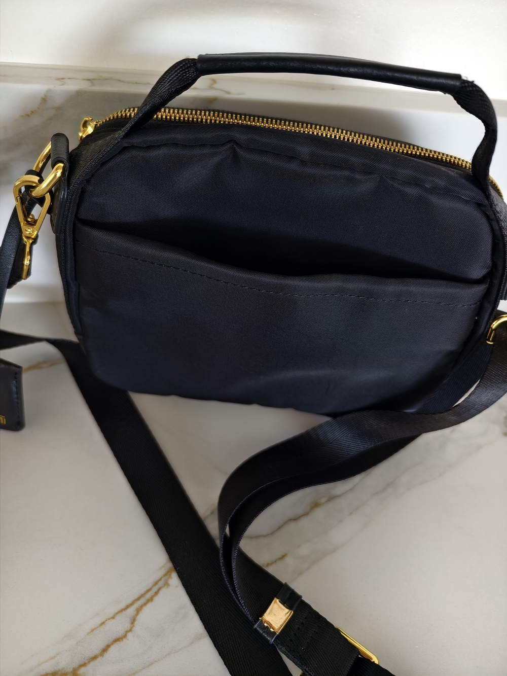 Tumi Black Crossbody Bag with Gold Hardware